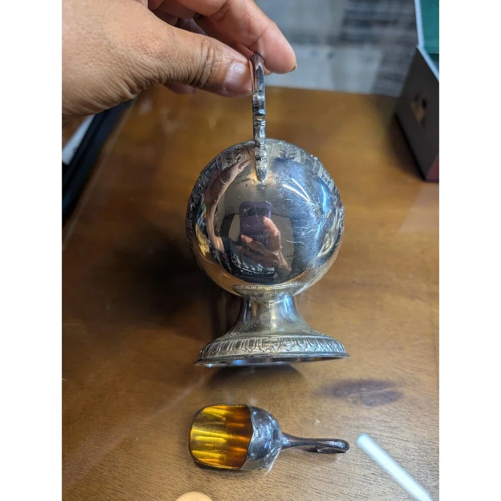 vintage silver-plated sugar scuttle with a matching mini scoop